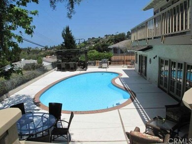 Pool looking toward spa and fire pit
