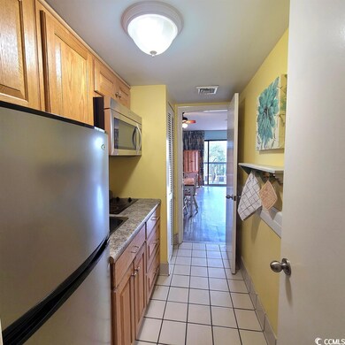 Stainless appliances. Fridge, range & microwave in