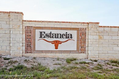 Estancia Sign on Stone Gate