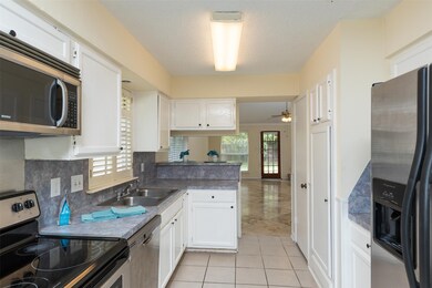 15646 Meadow Village Dr, Houston, TX 77095 - photo 6