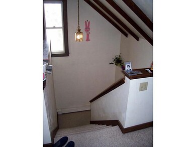 Exterior Front. entry to third floor