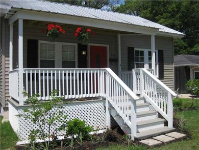 Facade/Exterior Front. A couple of chairs and a ni