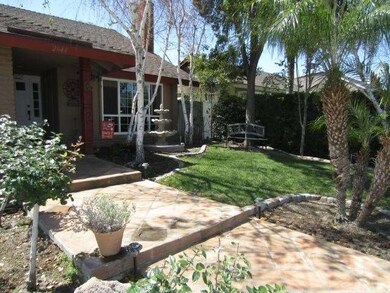 Saltillo Tile Entry, Nicely Landscaped Front Yard
