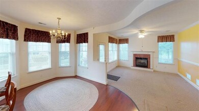 16 x 11 Dining room with bay of windows.  Laminate