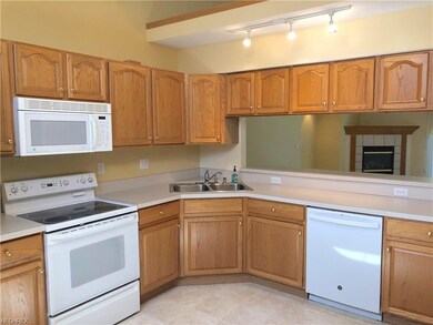 The kitchen opens to the great room, so while work