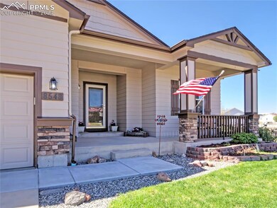 Covered front porch with area to relax in the even