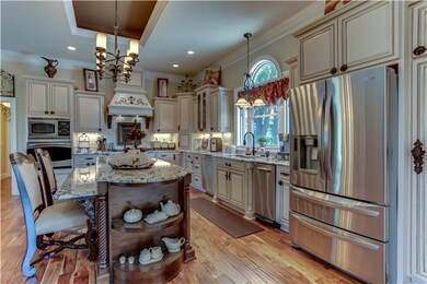 Another view of kitchen with very detailed cabinet