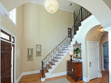 This two story entry welcomes family and guests al