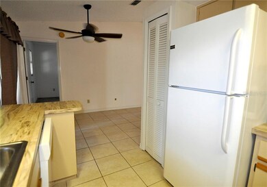 Kitchen looking back toward Master Bedroom w/Dinin