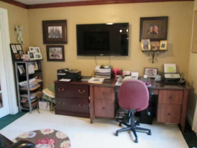 Den. DEN / HOME OFFICE ADJACENT TO KITCHEN