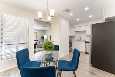 Dining space featuring light wood-style flooring,