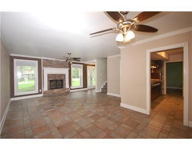 Living Room. Gas fireplace & ceramic tile flooring