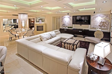Living room featuring recessed lighting, coffered