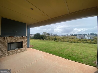 Actual photo of the covered deck w/ expansive view