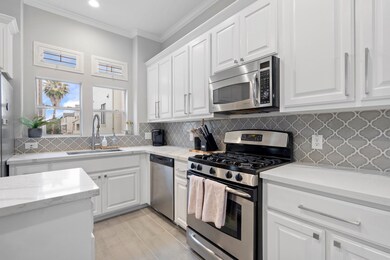Beautiful kitchen with natural light, plenty of st