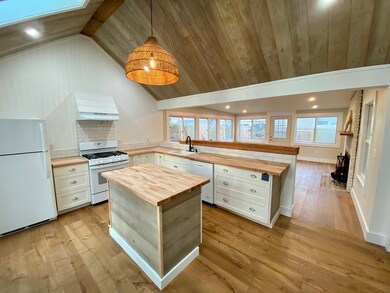 Kitchen with vaulted ceiling