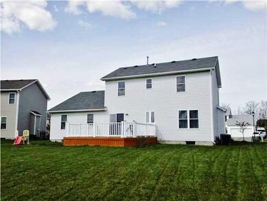 Exterior Back. The back of the house includes a fa