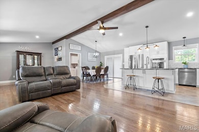 Open floor plan makes for easy entertaining!  LR opens to DR, kitchen, and hallway that leads to bedrooms