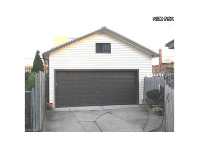 Oversized 2-car garage with second floor storage.