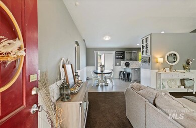 Living area with arched walkways and recessed lighting