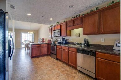 You will enjoy this spacious kitchen, with it's stainless steal appliances, upgraded cabinetry, pantry, and extensive countertops.  