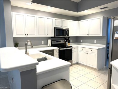 3445 Grand Cypress Dr unit 202, Naples, FL 34119 - photo 6