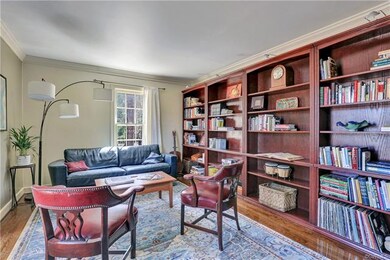 Accent lighting over top of book cases.