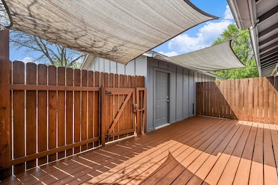 Deck with a gate and fence