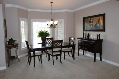 The home has a beautiful formal dining room.