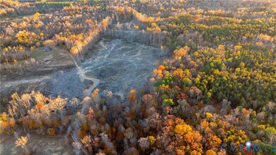 Drone / aerial view of a heavily wooded area