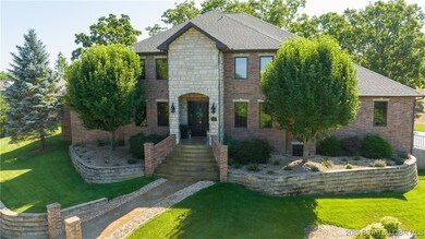 Impeccable landscaping all the way around the home