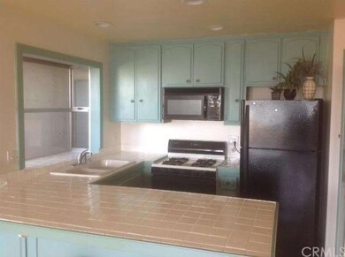 Beach Kitchen that features Dishwasher, Stove, Ove
