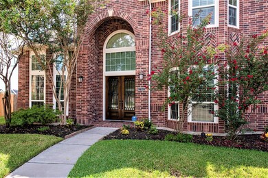 Stacked Bay-windows create a one-of-a kind unique elevation in this stately Perry home.