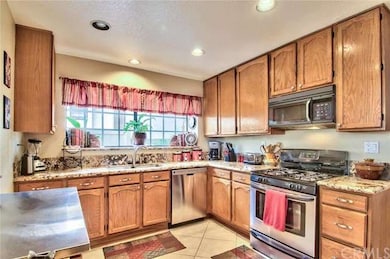 Gorgeous granite surfaces, dual sinks, Stainless S