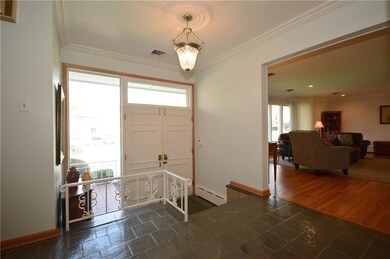 Enter this beautiful home through double doors wit