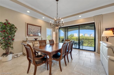 Formal dining inside with view to lanai and beyond.