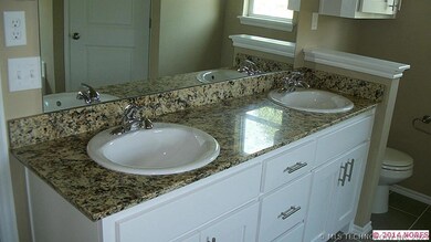 Granite counters in master bath.