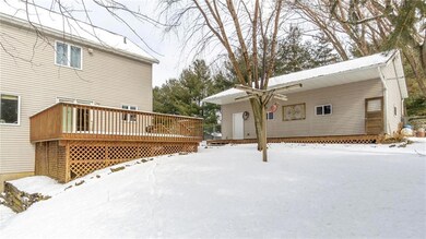 Back yard is fenced in! Mature trees provide summe