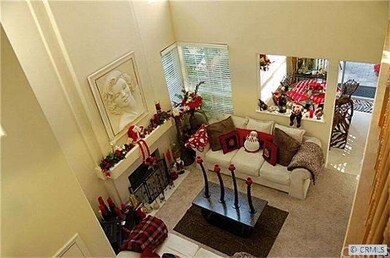 Open living room with vaulted ceilings.