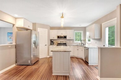 Alternate view of kitchen from the living room.  T