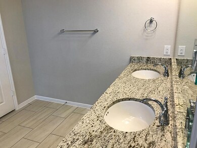 Double sinks and granite counter tops!