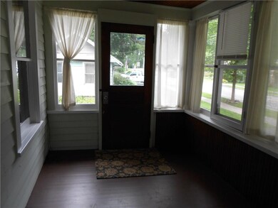 You'll enjoy relaxing on the enclosed porch.