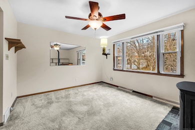 Living room flows easily to the kitchen and dining area, Large window overlooks the front yard.