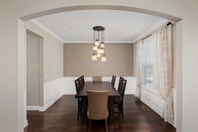 Formal dining room with wainscotting