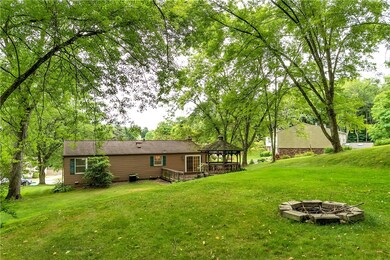 The Lot is .43 Acres and Backs to Woods with a Fir
