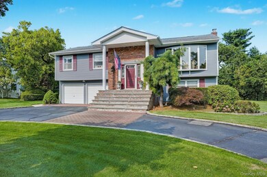 20 Peppermint Rd, ComMacK, NY 11725 - photo 3