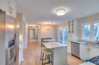 Remodeled kitchen with view of island