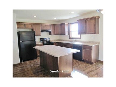 Kitchen. Picture is of Similar Unit.