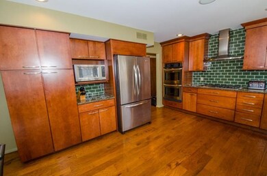 Cherry Cabinets with Hickory flooring