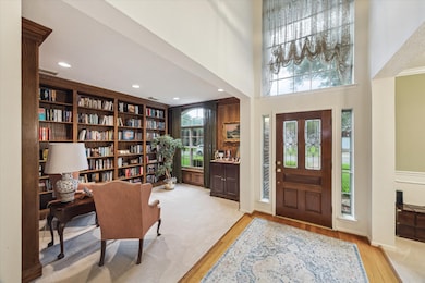 A grand two story entryway and great natural light welcomes all who enter.